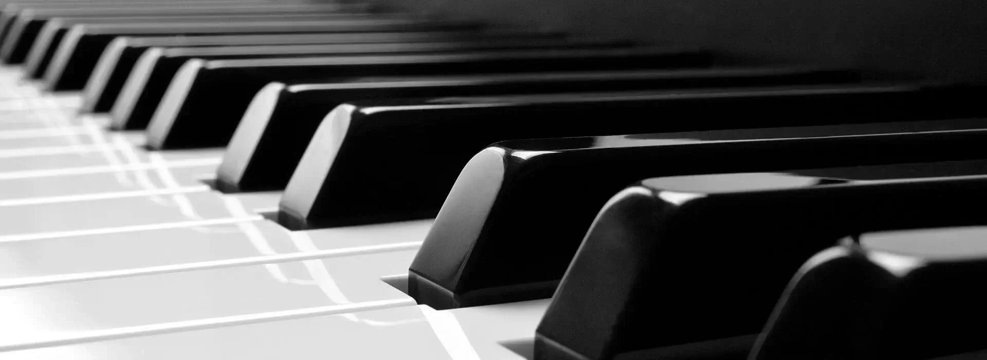 public/uploads/banner_images/piano-bg-1611795400.webp